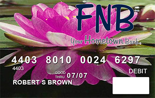 debit card showing a blooming lotus flower